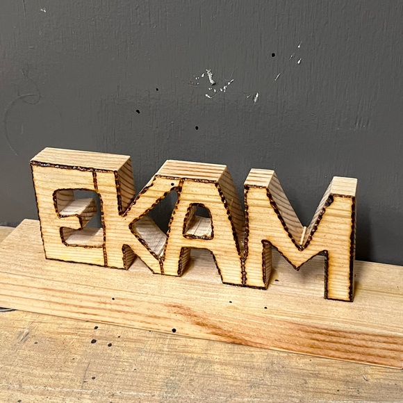 ekxm